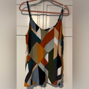 LIKE NEW: Torrid geometric spaghetti step flowy top